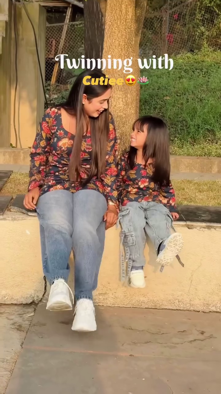 Twinning Floral Outfit Moment Between Mother and Daughter