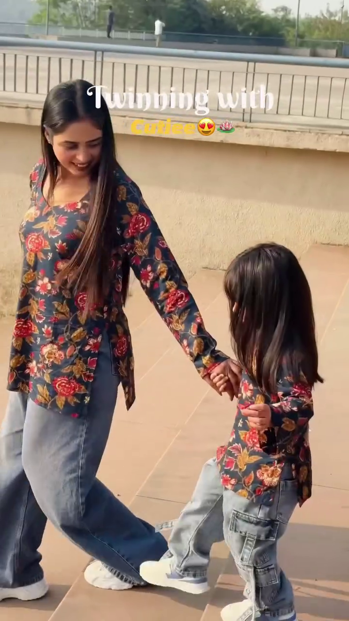 Twinning Floral Outfit Moment Between Mother and Daughter
