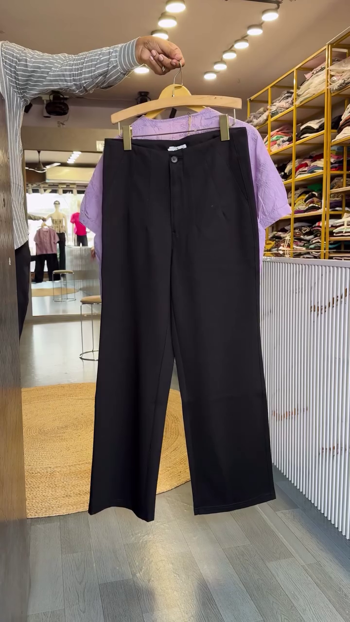 Elegant Lavender Top with Classic Black Wide-Leg Trousers