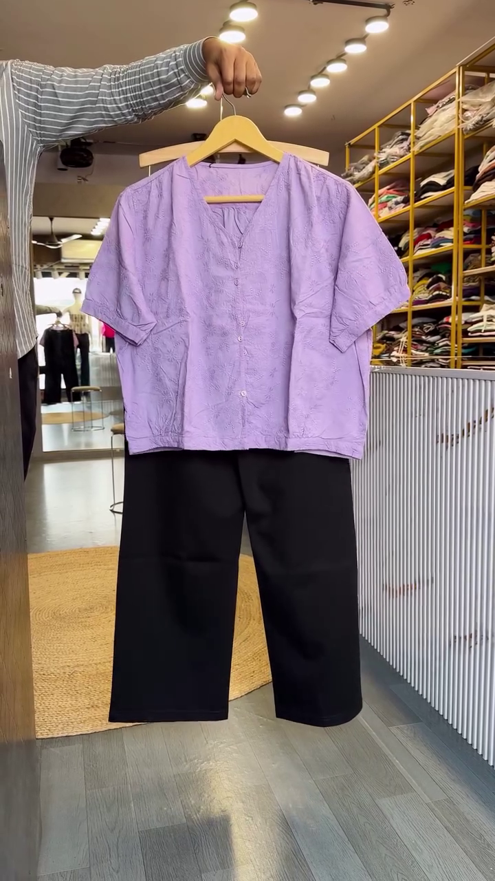 Elegant Lavender Top with Classic Black Wide-Leg Trousers