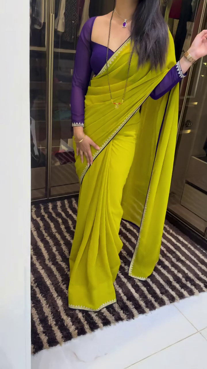 Yellow Designer Saree with Purple Blouse