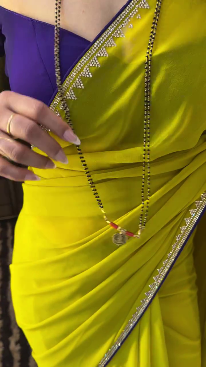 Yellow Designer Saree with Purple Blouse