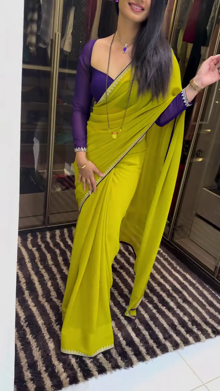 Yellow Designer Saree with Purple Blouse