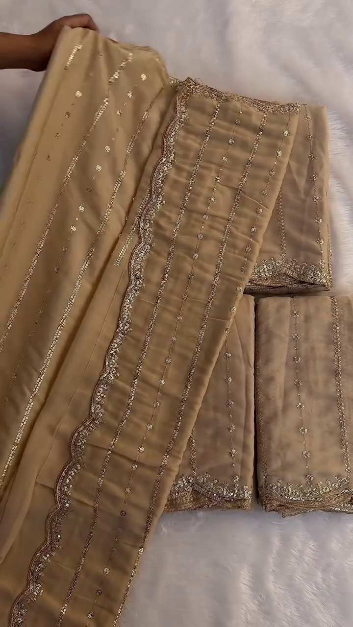 Regal Beige Saree with Ruby Blouse